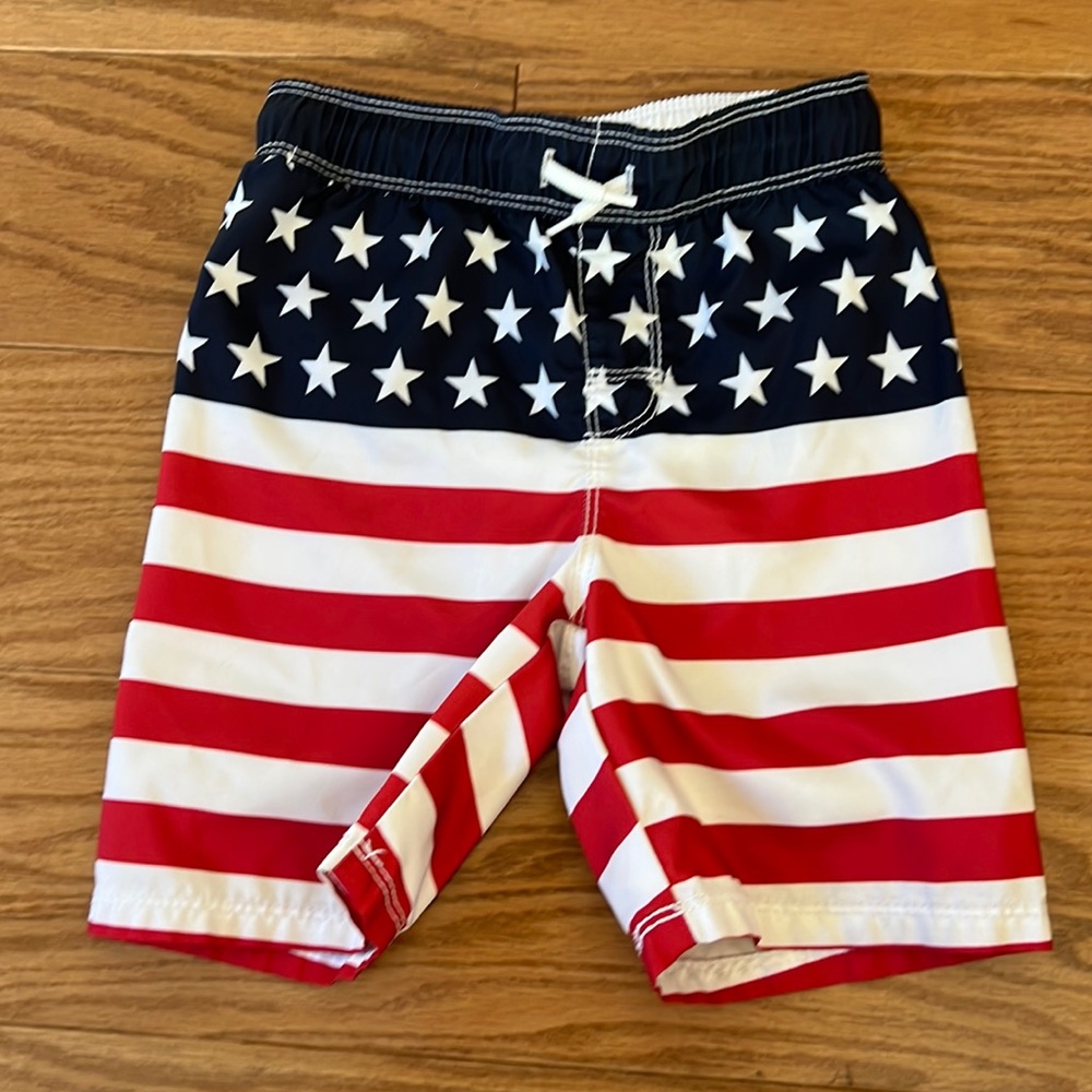 Boys American Flag 🇺🇸 swim trunks.